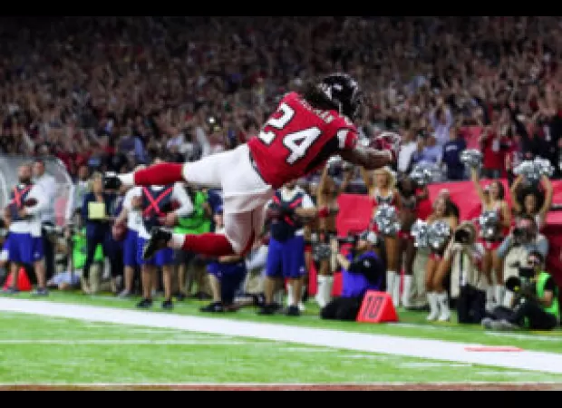 NFL RBs face financial squeeze & potential extinction due to changing game.