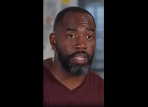 Man in pain from large bump on his back, making him feel like a 