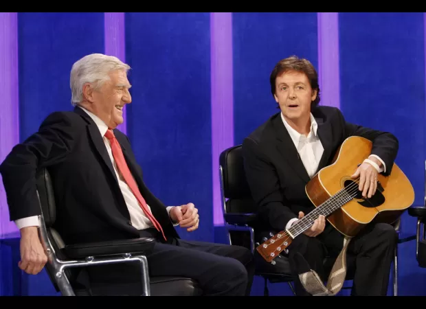 McCartney remembers Parkinson's influence on album cover in heartfelt tribute.