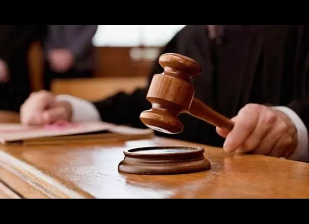 Court revokes bail for accused in BJP worker's murder and orders arrest warrant.