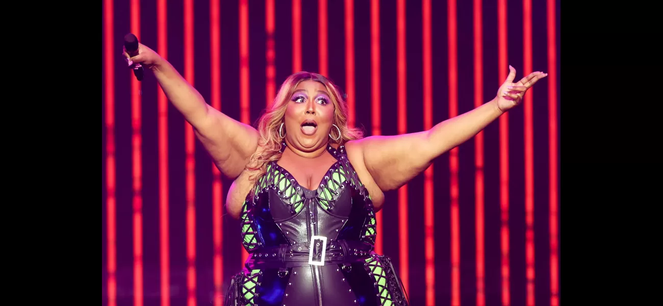 Lizzo says she's staying positive despite the sexual harassment lawsuit.