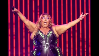 Lizzo says she's staying positive despite the sexual harassment lawsuit.