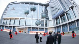Kim Jong-un has bodyguards carrying briefcases to guard against assassins.
