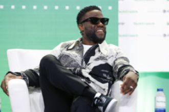 Kevin Hart has to use a wheelchair after challenging a former NFL player to a race.