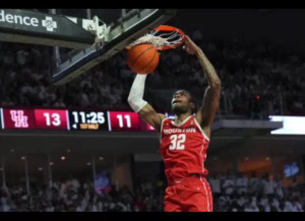 Reggie Chaney, ex-UH basketball player, found dead in his Texas home.