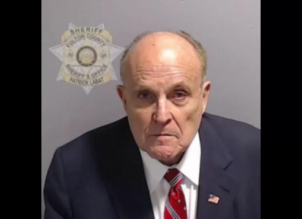 Giuliani turns himself in to face charges related to the 2020 election.