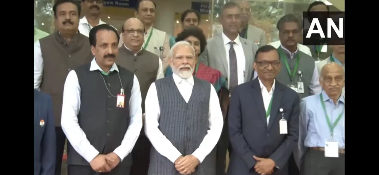 PM Modi visits ISRO scientists in Bengaluru to celebrate Chandrayaan-3 mission's success.