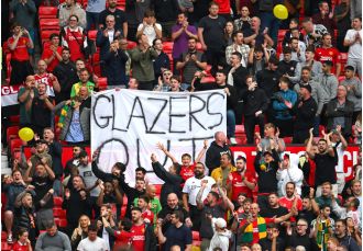 Manchester United fans stage sit-in protest against Glazers after team's win vs Nottingham Forest.