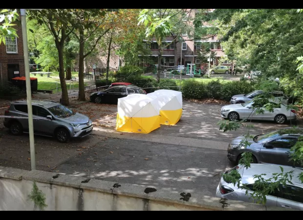 Man stabbed to death near London Tube station; murder investigation underway.