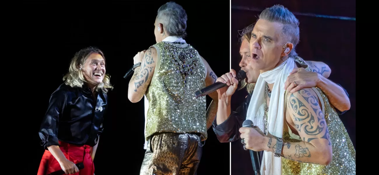 Robbie and Mark reunite on stage for the first time in 12 years.