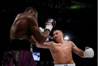 Usyk defeats Dubois to keep his heavyweight titles.