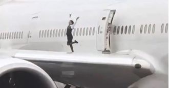 Airline execs outraged after crew members filmed dancing on the wing of a Boeing 777.