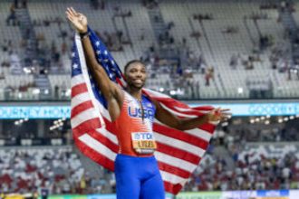 Noah Lyles gets attention from NBA players after questioning their championship wins.