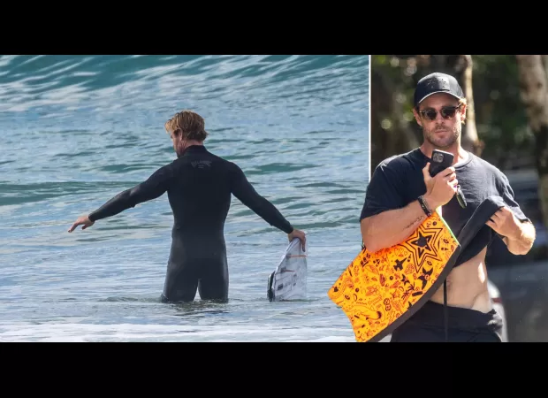 Chris Hemsworth, 40, shows off his toned V-line while getting ready to go surfing in Byron Bay.