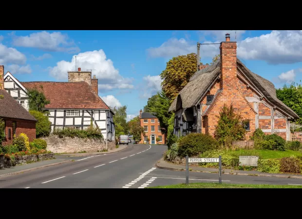 A UK village with picturesque cottages, known as a 