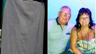 They were amazed to see a legendary rock star's face on a beach towel.