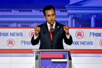 Young Ramaswamy's questioning of Al Sharpton at 2003 town hall has gone viral in a video.
