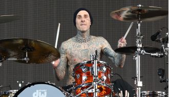 Travis Barker visited a prayer room before quickly leaving for a family emergency during Blink-182's tour.