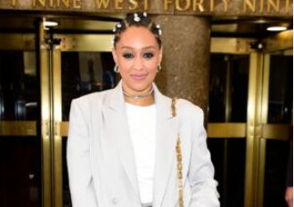 Tia Mowry identifies as a black woman despite her biracial background.