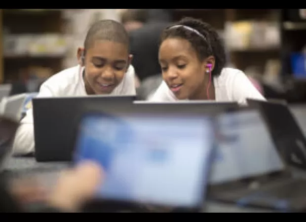 Teacher uses catchy lyrics to capture students' attention.