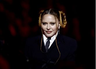 Madonna to perform slower after health scare.