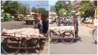 Elderly woman in Meerut carries her son's dead body on a cart, sparking probe after video goes viral.