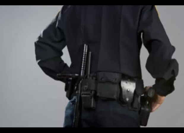 Officer suspended after video showed him kissing and entering backseat with woman.