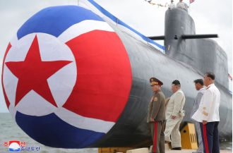 Kim Jong-un says new sub will cause US to fear its nuclear power.