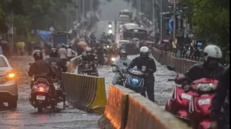 Mumbai hit with heavy rains, causing traffic chaos and waterlogged streets.