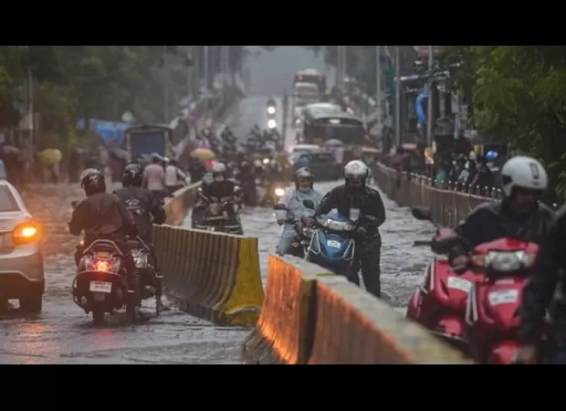 Mumbai hit with heavy rains, causing traffic chaos and waterlogged streets.