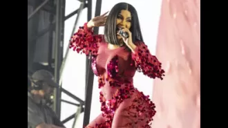 Cardi B doesn't regret hitting a fan with a mic during a show.