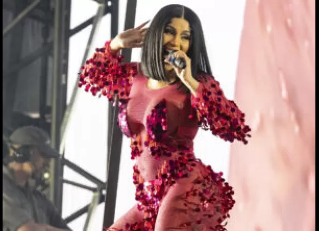 Cardi B doesn't regret hitting a fan with a mic during a show.