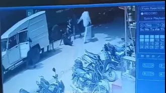 Armed men on motorbikes looted ₹22 lakh from Axis Bank cash van, guard killed in firing.