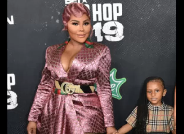 Lil Kim's daughter rocks the runway at New York Fashion Week.