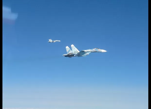 Russian pilot mistakenly fired missiles at an RAF plane due to a command mix-up.