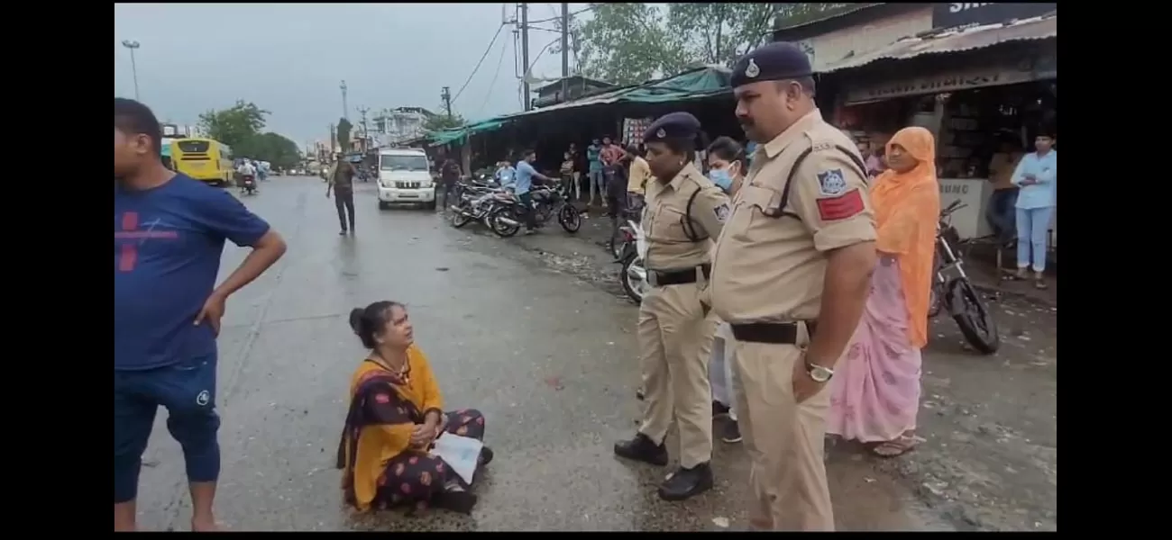 Nurse in Madhya Pradesh protests transfer by sitting on the road in Sehore.