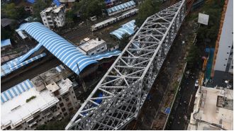 Uddhav Thackeray's Shiv Sena faction visits delayed Delisle Bridge, urging faster completion.