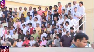 MPs gather for Special Session of Parliament Day 2; new building ready to welcome them, members take part in photo-session.