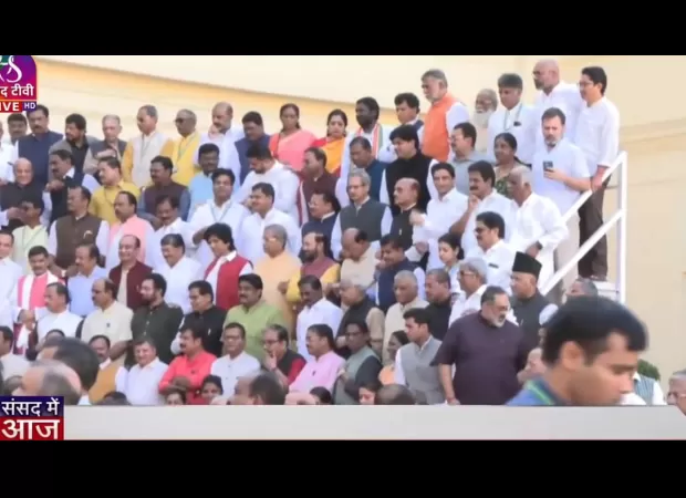 MPs gather for Special Session of Parliament Day 2; new building ready to welcome them, members take part in photo-session.
