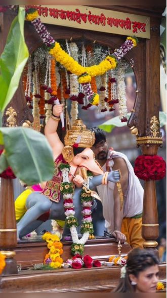 Celebrating Pune's iconic Ganeshotsav through photos of Dagdusheth and Bhausaheb Rangari.