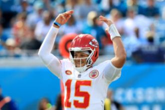 Mahomes signs a massive $450M contract, securing his future as a star QB for the Chiefs.