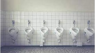Students made to clean bathroom and collect dung for fuel at primary school in India.