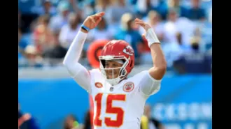 Mahomes signs a massive $450M contract, securing his future as a star QB for the Chiefs.