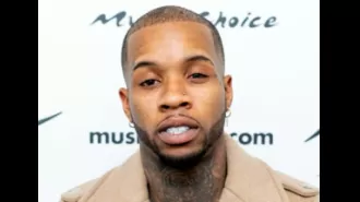 Tory Lanez is in state prison with a new look.