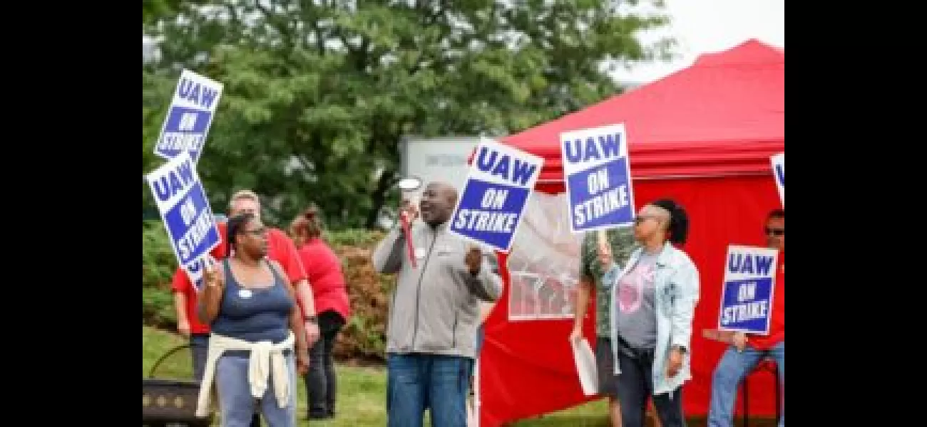 Man yells racist slurs at striking auto workers in Detroit, leading to a brawl.
