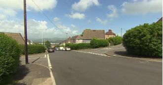 Two 11-year-old girls suffered serious injuries after being struck by a motorbike, two men were arrested.