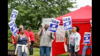 Man yells racist slurs at striking auto workers in Detroit, leading to a brawl.