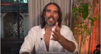 Russell Brand condemns attempts to silence free speech in his return to live shows amidst allegations of sexual assault.