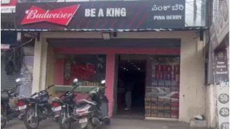 Video of a liquor shop in Bengaluru selling alcohol with half-shutter down during the bandh goes viral.