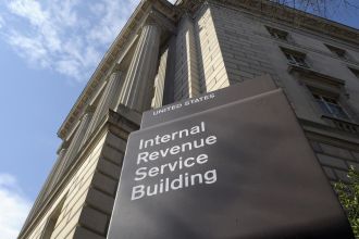 An IRS consultant has been charged in connection with the large-scale unauthorized release of taxpayer data.